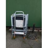 A set of four folding metal and canvas garden chairs, a step ladder and a parasol stand. (6)