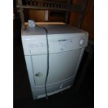 A Tricity Bendix condenser dryer, model no TM310W.