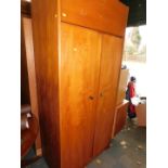 A 1970's teak dressing table with lift lid compartment, 72cm high, 107cm wide, 42cm deep, together