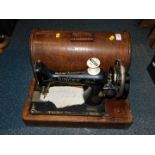 A Singer sewing machine, cased.
