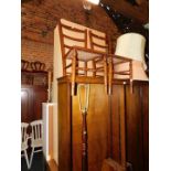 A pair of Edwardian cane bedroom chairs, together with a mahogany standard lamp, 169cm high., and