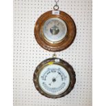 A Victorian oak framed circular wall barometer, with thermometer, 22cm diameter, together with an