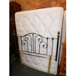 A Rest Assured double bed, mattress and brass headboard. (3)