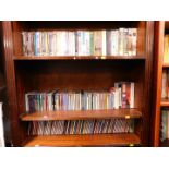 DVDs, including war and classic films, VHS video box sets and CDs, chiefly classical and jazz. (3