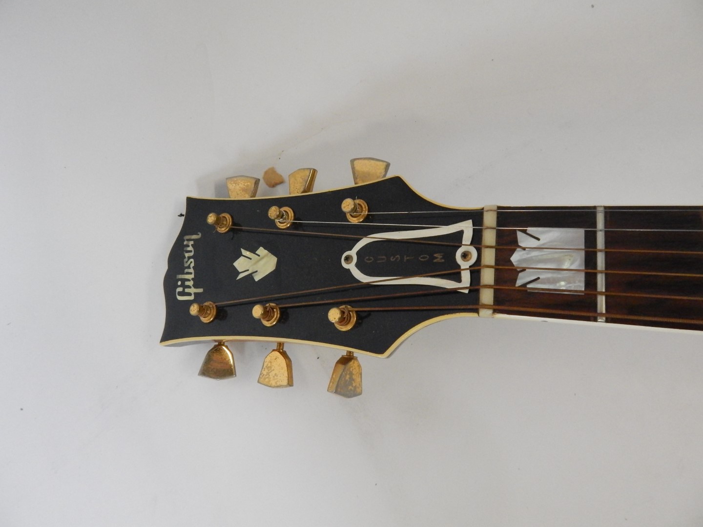 A Gibson J-200 Custom standard acoustic guitar, circa 1963/64, with a maple back and sides, mother- - Bild 6 aus 7