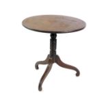 A late Georgian mahogany occasional table, made up, the circular top raised on a turned column above