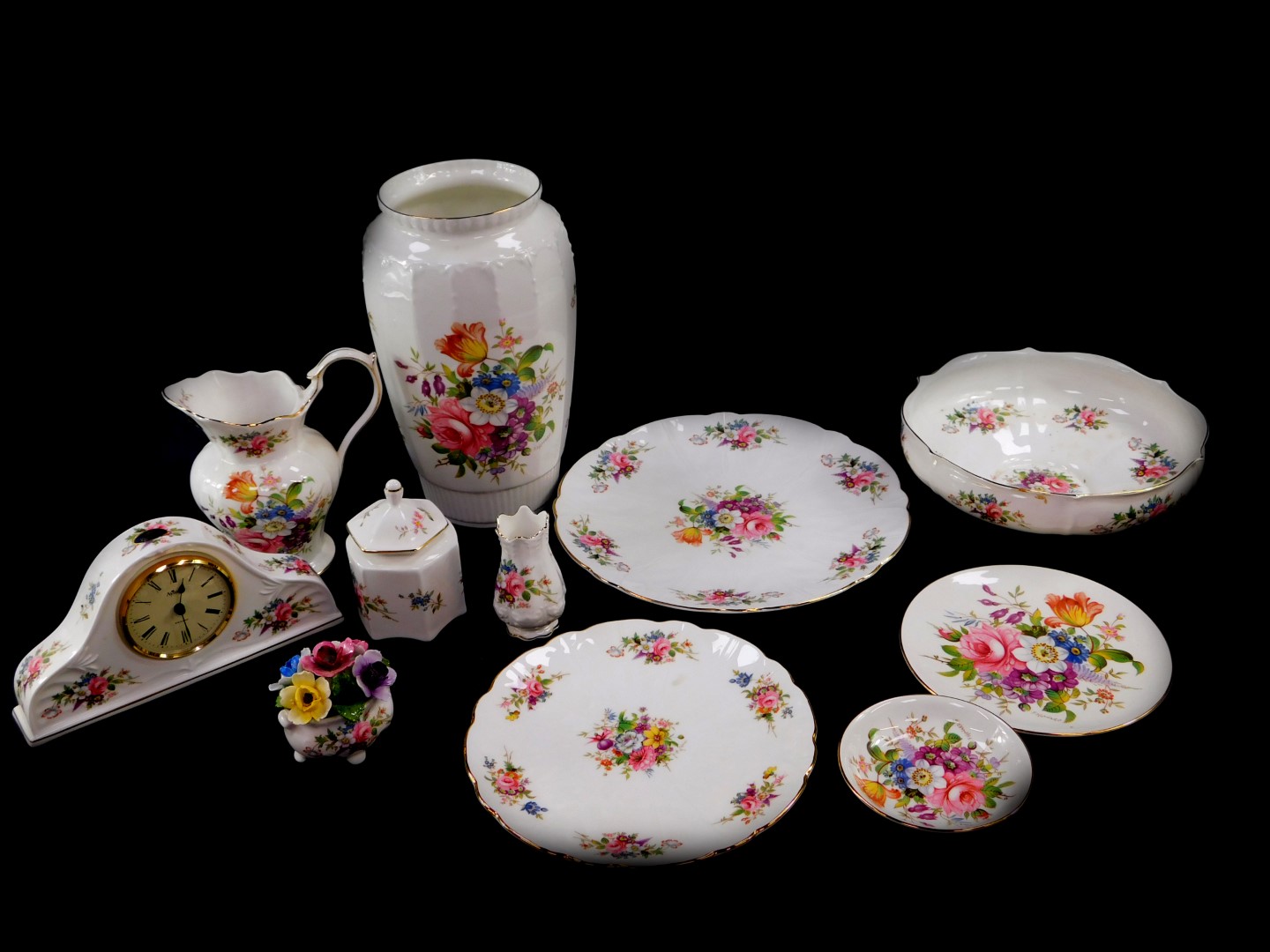 A group of Aynsley porcelain decorated in the Howard Sprays pattern, including a fluted vase,