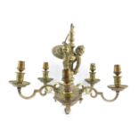 An early 20thC heavy brass five branch chandelier, embossed with leaves and cast with three