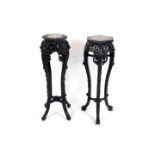 Two Chinese Padouk wood and marble inlaid urn stands, one octagonal stand with profusely carved with