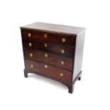 A George III oak country chest, of four long graduated drawers, raised on bracket feet, 93cm high,