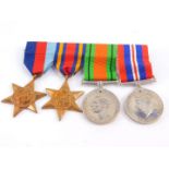 A set of WWII medals, comprising 1939/45 Star, Burma Star, Defence and War medals.