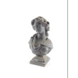 After The Antique. A 19thC lead bust of a lady, raised on a square plinth, 24cm high.