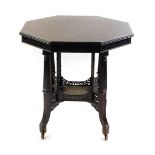 A Victorian mahogany octagonal occasional table, the frieze decorated with blind fret work, raised