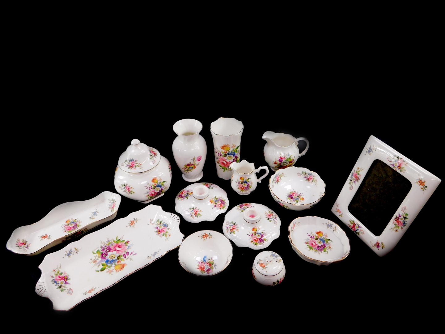 A group of Aynsley porcelain decorated in the Howard Sprays pattern, including a pair of