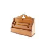 Withdrawn pre-sale by executors- A Victorian pale oak waterfall stationery rack,