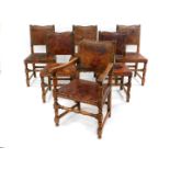 A set of six Carolean oak dining chairs, 19thC, with leather seats and backs, raised on turned
