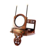 A Rowsell's walnut and mahogany graphoscope, 43cm high, 35cm wide.