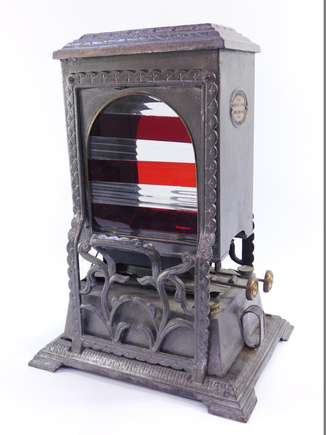 A Wright & Butler patent "Cheerful" petroleum stove, Birmingham, with cast foliate decoration, front