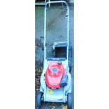 A Honda HRB423 petrol self propelled lawn mower, with 17" cut.