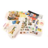 Philately. EII, mint commemoratives and definitives, including seven books of ten first class