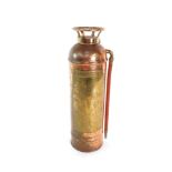 A Johns Manville copper and brass 2 1/2 gallon fire extinguisher, no A896136, 62cm high.