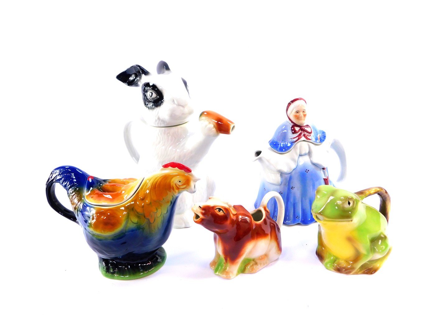 Three Tony Wood pottery novelty teapots, comprising a rabbit, cockerel and an old woman, together