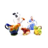 Three Tony Wood pottery novelty teapots, comprising a rabbit, cockerel and an old woman, together