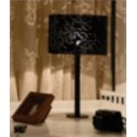 A designer table lamp, with black flower fret work shade, Peony, designed by Meiha Tsang for