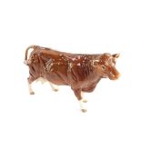 A Beswick figure of a Limousin cow, 1996, boxed. (A/F)