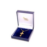 An 18ct gold cross, with foliate engraved decoration on chain, 8.2g.