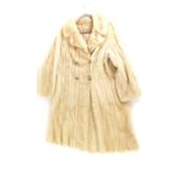 A Calman Links white mink fur coat.