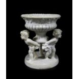 After Gian Lorenzo Bernini. An alabaster comport, the bowl of semi fluted pedestal form decorated