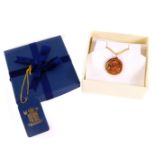 A Queen Elizabeth II gold full sovereign 2000, in a 9ct gold pendant mount on chain, 15.3g.