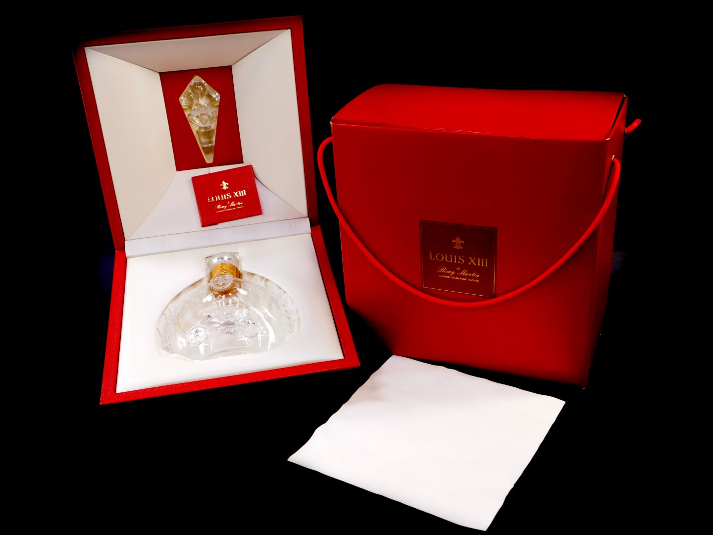 A Baccarat For Remy Martin cut glass cognac decanter and stopper, .70l. decorated with fleur de