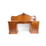 Withdrawn pre-sale by executors- A Victorian serpentine mahogany breakfront sideboard,