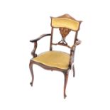 A Victorian mahogany carver chair, satin wood and ivory inlaid with husks, drapes and foliate