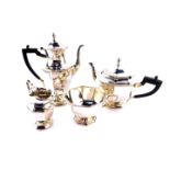 A George V silver four piece tea and coffee set, of octagonal baluster form, comprising teapot,