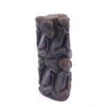 A Northern Mozambique Makonde ebony family tree carving, depicting two rows of eight crouching and