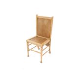 An Arts & Crafts style light beech chair cum trouser press, with solid seat and back, raised on