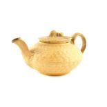 A Wedgwood early 19thC cane ware teapot and cover, with sheaf of corn finial, impressed mark, 14.5cm