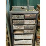 A pine blanket box, converted to a chest with an arrangement of seven short and three long