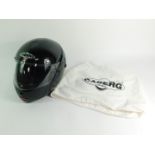 A Caberg Justissimo black motorcycle helmet, with bag, boxed.