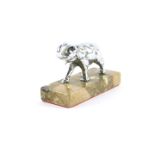 A chrome metal car mascot modelled as an elephant, in standing pose, raised on a marble base, 9.