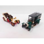 Two Franklin Mint die cast models, comprising a 1907 Rolls Royce Silver Ghost, and a 1904 Mercedes