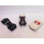 Three Franklin Mint die cast precision models, boxed, comprising a 1935 Auburn 815 Speedster.,