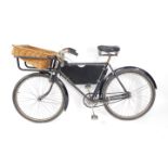 A vintage mid 20thC Phillips grocer's bicycle, black frame, with basket.