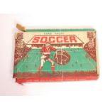 A Chad Valley Soccer game, having a metal base with plastic figures operated by levers, boxed.