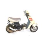 A child's Monkey bicycle, with Fun Scooter 65 Moto Sports decals.