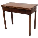A mahogany card table, with mahogany banding to top, of fold out design, with plain interior, on
