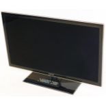 A Samsung 37" colour television, in black trim, with remote control and wire. UE37D5000.